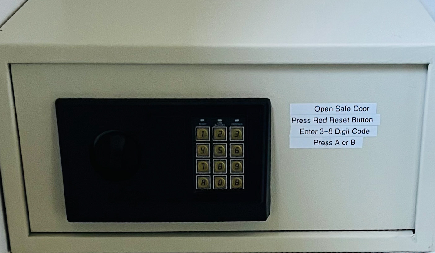 Casa Tranquila in-room safe keypad with instruction label